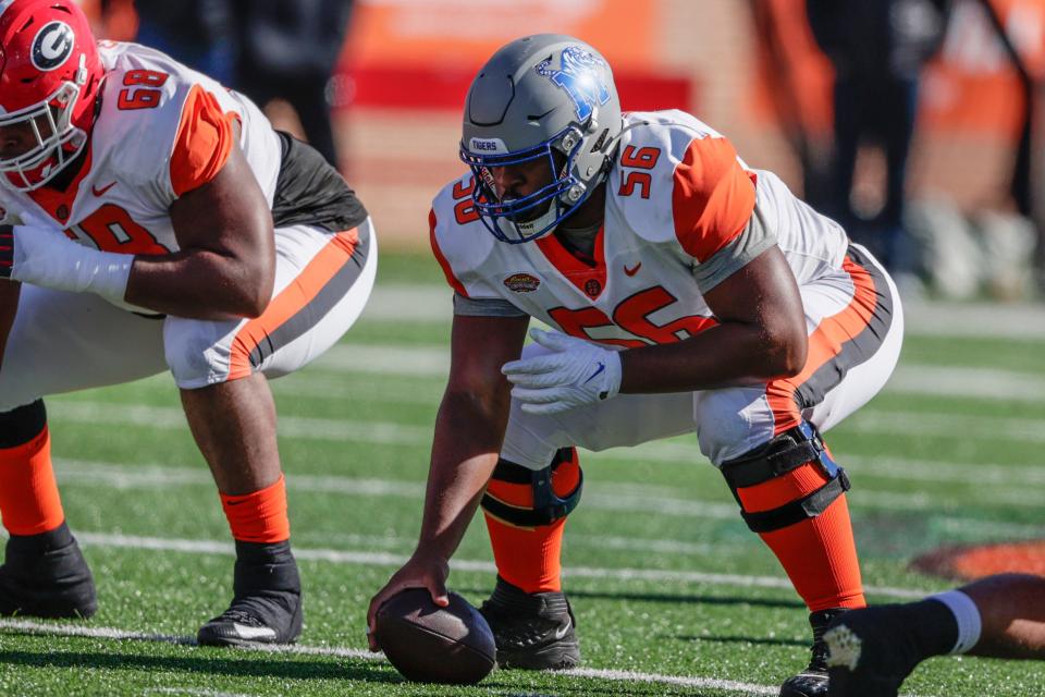 American Team offensive lineman Dylan Parham of Memphis (56) snaps the ball in an NCAA college football game Saturday, Feb. 5, 2022, in Mobile, Ala. (AP Photo/Butch Dill)