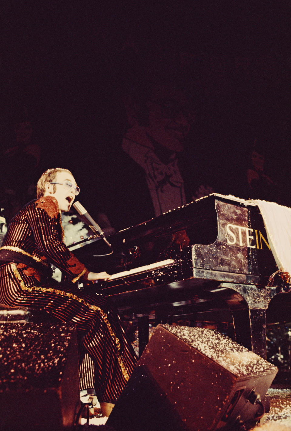 British singer Elton John performs on stage during his Christmas show at the Hammersmith Odeon in London, UK, 21st December 1973. (Photo by Michael Putland/Getty Images)