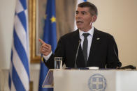 Israel's Foreign Minister Gabi Ashkenazi speaks during a join news conference with his Greek counterpart Nikos Dendias,and Cypriot Foreign Minister Nikos Christodoulides after a meeting between the foreign Ministers of Greece , Israel and Cyprus in Athens, on Tuesday, Oct. 27, 2020. (AP Photo/Petros Giannakouris)