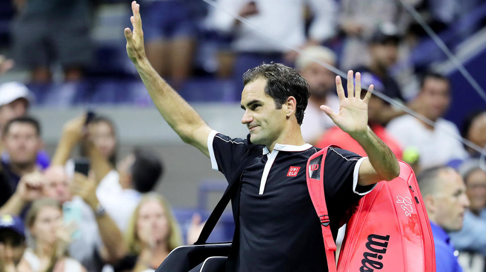 Roger Federer thanks the crowd after his loss to Grigor Dimitrov at the US Open.