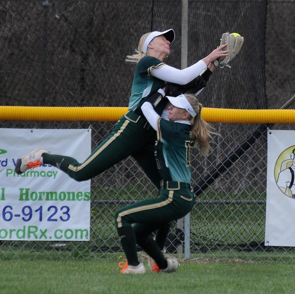 Left fielder Alayna Pinkleman makes the catch colliding with her teammate centerfielder Callie Cousino of SMCC against Jefferson Wednesday, April 19, 2023.