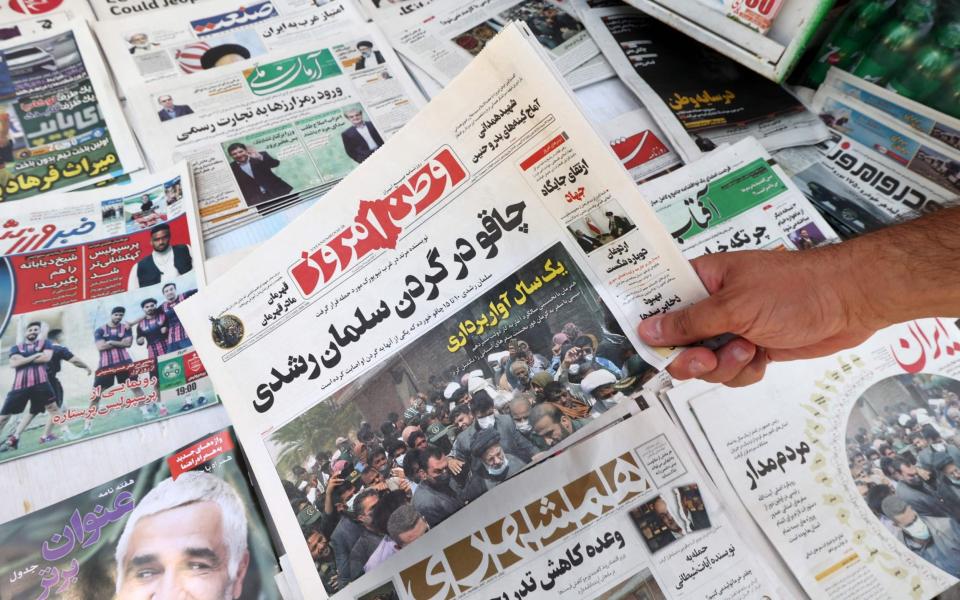 Iran papers - ATTA KENARE/AFP via Getty Images