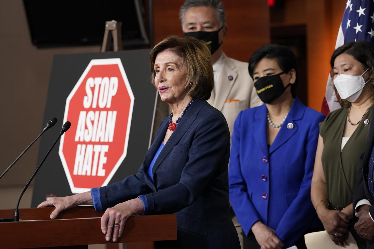 House Speaker Nancy Pelosi of Calif., left, speaks during a news conference on Capitol Hill in Washington, Tuesday, May 18, 2021, on the COVID-19 Hate Crimes Act. Pelosi is joined by Rep. Mark Takano, D-Calif., second from left, Rep. Judy Chu, D-Calif., second from right and Rep. Grace Meng, D-N.Y. (AP Photo/Susan Walsh)