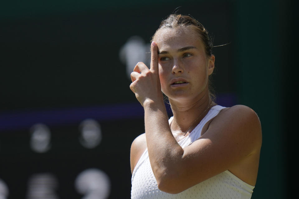 Aryna Sabalenka of Belarus prepares to serve to Varvara Gracheva of France during the women's singles match on day five of the Wimbledon tennis championships in London, Friday, July 7, 2023. (AP Photo/Alastair Grant)