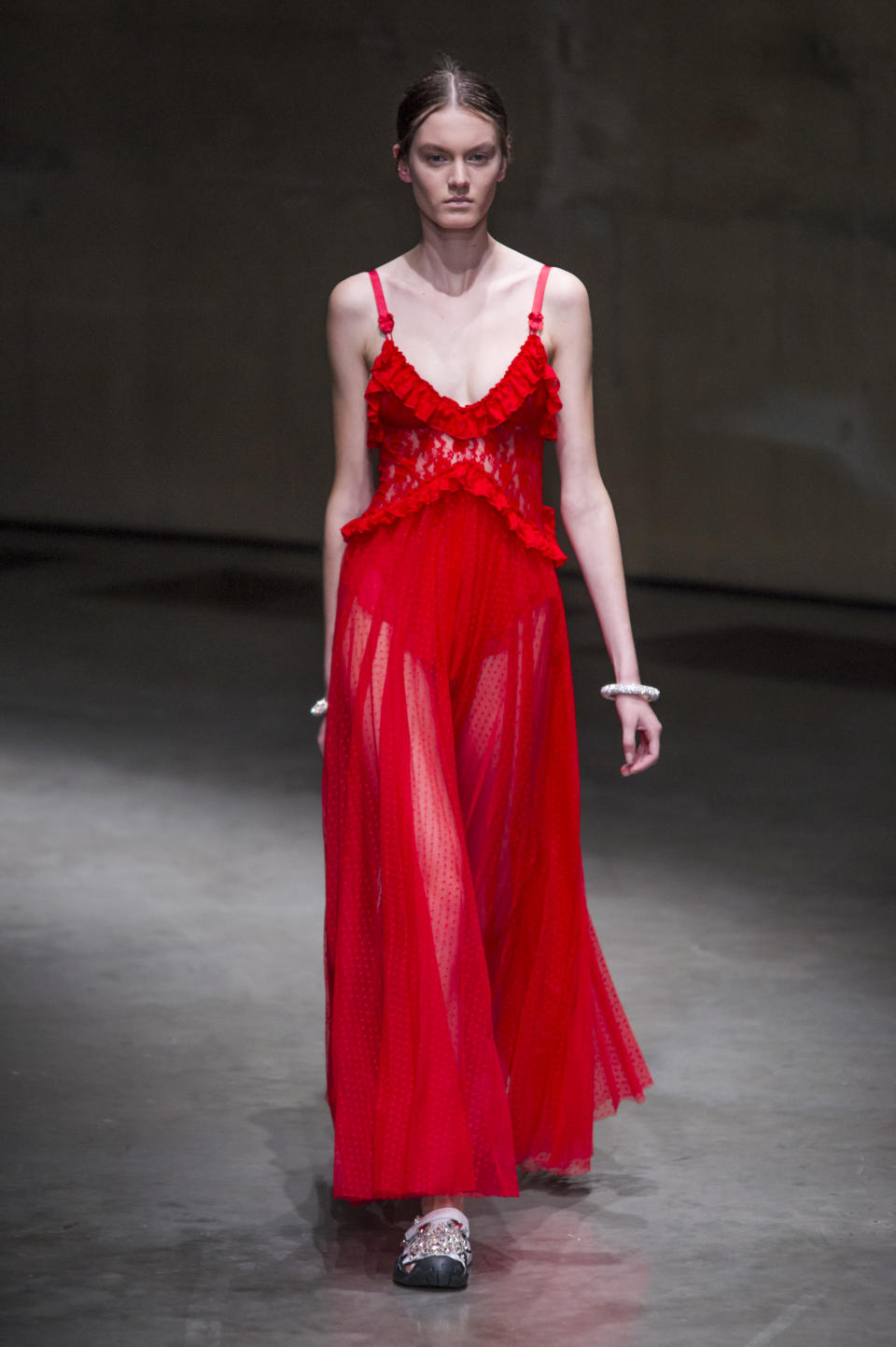 <p><i>Bold red semi-sheer ruffle bodice dress from the SS18 Christopher Kane collection. (Photo: IMAXtree) </i></p>