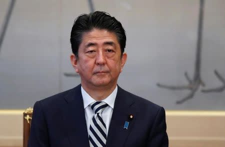 Japan's Prime Minister Shinzo Abe attends a meeting at the Imperial Household Agency in Tokyo, Japan December 1, 2017. REUTERS/Toru Hanai