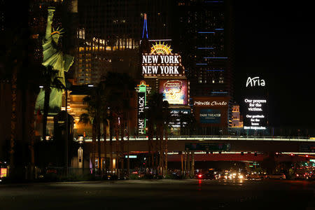 Las Vegas Boulevard lights-up with with signs for the victims and first responders after a mass shooing at the Route 91 Harvest Country Music Festival in Las Vegas, Nevada, U.S., October 2, 2017. REUTERS/Mike Blake