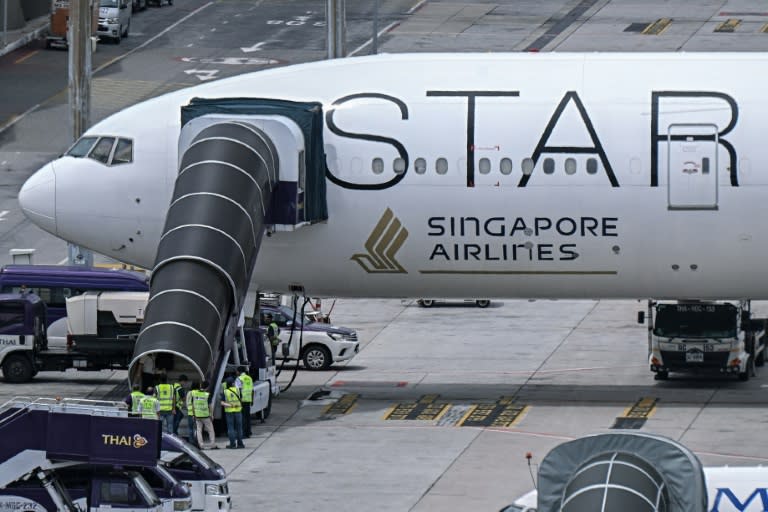 Several passengers were injured during violent turbulence on a Singapore Airlines flight from London in May 2024 which had to be diverted to Bangkok (Lillian SUWANRUMPHA)