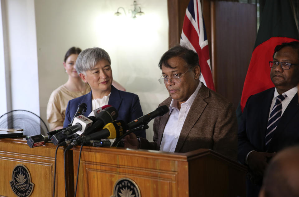 Australian Foreign Minister Penny Wong, left, and Bangladeshi Foreign Minister Hasan Mahmud address the media after their meeting in Dhaka, Bangladesh, Tuesday, May 21, 2024. (AP Photo/Mahmud Hossain Opu)