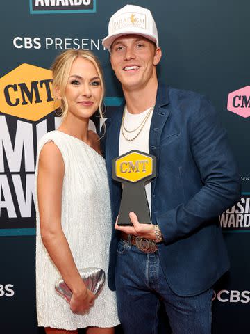 <p>Jason Kempin/Getty</p> Hallie Ray Light and Parker McCollum attend the 2022 CMT Music Awards on April 11, 2022 in Nashville, Tennessee.