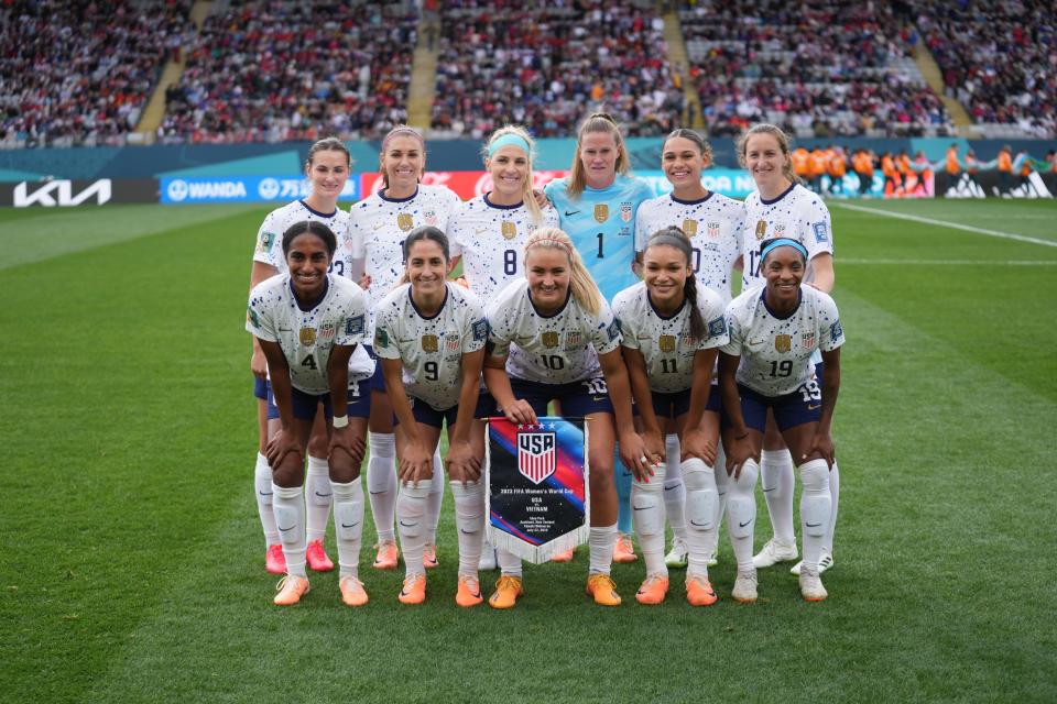 The starting 11 for the USWNT's opening game at the 2023 World Cup pose for a photo before playing Vietnam on July 22.