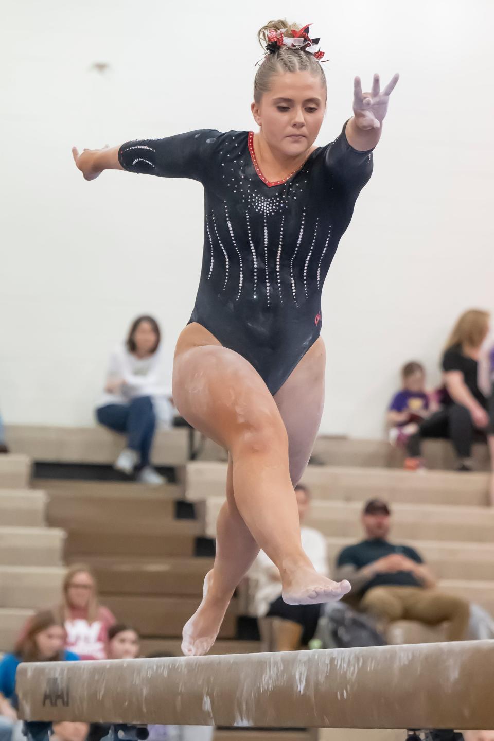 Lafayette Jefferson Katherine Graves competes on the beam during the IHSAA Girls Gymnastics Sectional, Saturday Feb 24, 2024, at Lafayette Jefferson High School in Lafayette, Ind. Northwestern finished in first place.