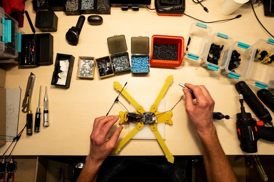 An engineer installs components in Kyiv region, Ukraine.