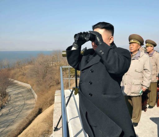 This photo, released by North Korea's official Korean Central News Agency (KCNA) on March 15, shows N. Korean leader Kim Jong-Un inspecting a military strike drill. South Korea accused North Korea Monday of trying to develop a nuclear-armed missile through a satellite launch next month, after Pyongyang dismissed international calls to abandon the exercise