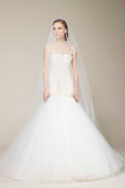 <div class="caption-credit"> Photo by: Marchesa</div><div class="caption-title">23. Marchesa</div>This tulle wonder by Marchesa is graceful and alluring at the same time. <br> <br> Check out more gorgeous styles in our <a rel="nofollow noopener" href="http://www.bridalguide.com/photo-galleries/bridal-gowns/marchesa/look-1" target="_blank" data-ylk="slk:Marchesa gown gallery;elm:context_link;itc:0" class="link ">Marchesa gown gallery</a>!