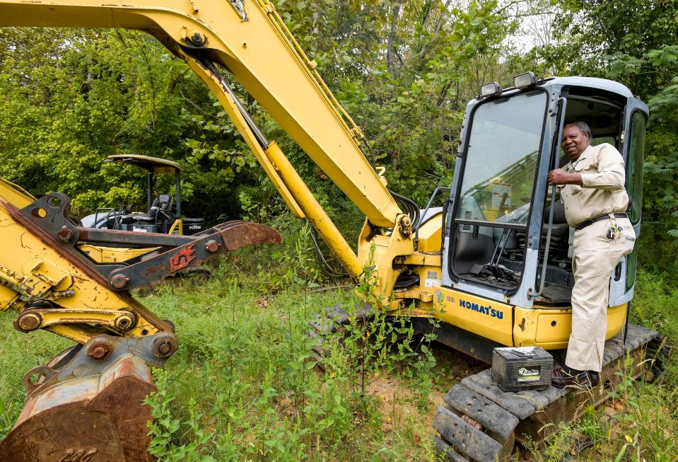 Reuben Gardner cranks up some of his earthmoving equipment in Prattville on Sept. 28.