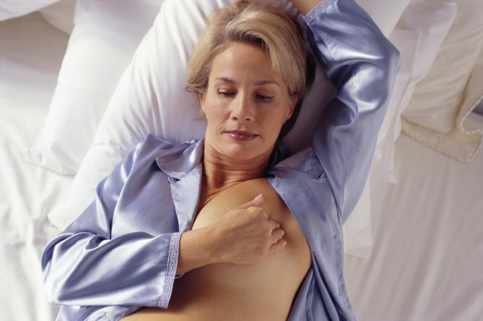 To conduct a breast self-exam, a Canadian doctor suggested checking yourself while taking a shower or as you lie down on your bed. (Photo via Getty Images)