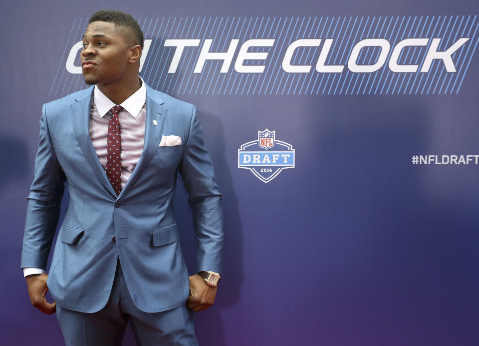 Buffalo linebacker Khalil Mack poses for photos on the red carpet upon arriving for the first round of the 2014 NFL Draft, Thursday, May 8, 2014, in New York. (AP Photo/Craig Ruttle)