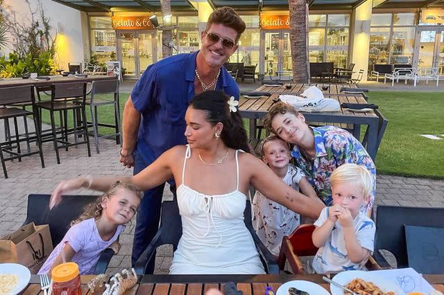 <p>Robin Thicke/ Instagram</p> Robin Thicke and girlfriend April Love Geary pose with their three kids, Mia, 5, Lola, 4, and Luca, 2, as well as Julian, 13