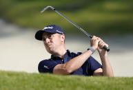 Justin Thomas hits his second shot from the bunker on the fourth hole during the second round of the Genesis Invitational golf tournament at Riviera Country Club, Friday, Feb. 14, 2020, in the Pacific Palisades area of Los Angeles. (AP Photo/Ryan Kang)