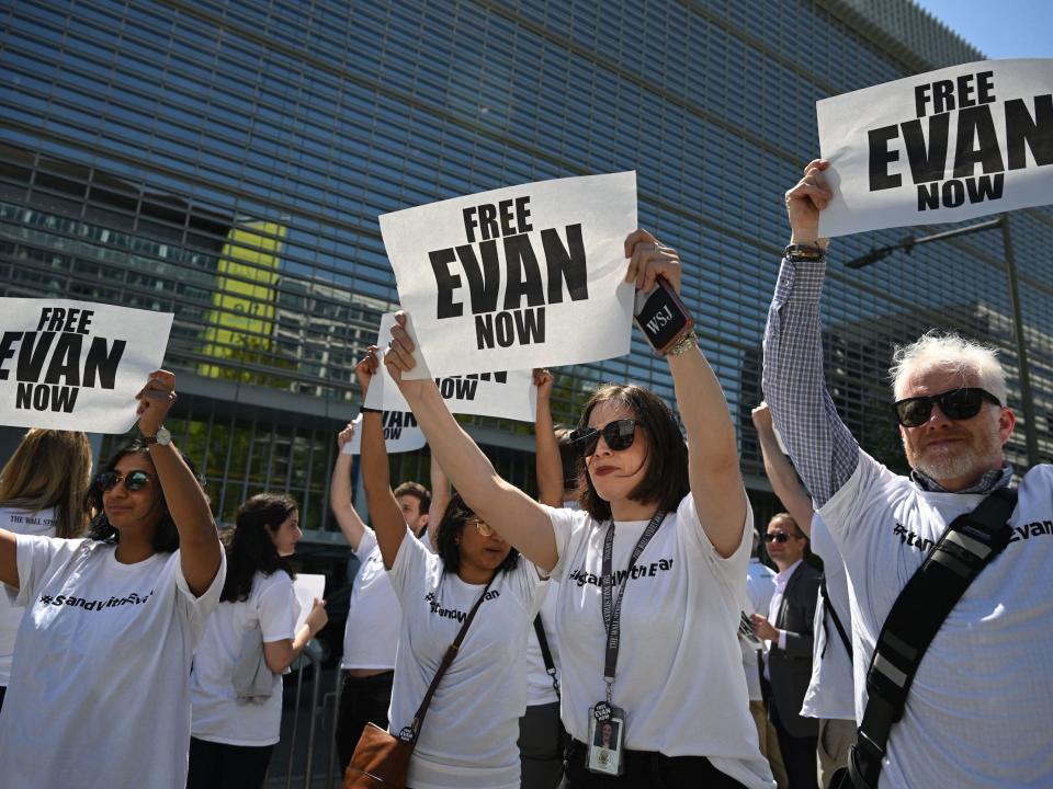 The Independent Association of Publishers' Employees and Wall Street Journal journalists hold signs reading "Free Evan Now" during a rally calling for the release of Wall Street Journal reporter Evan Gershkovich