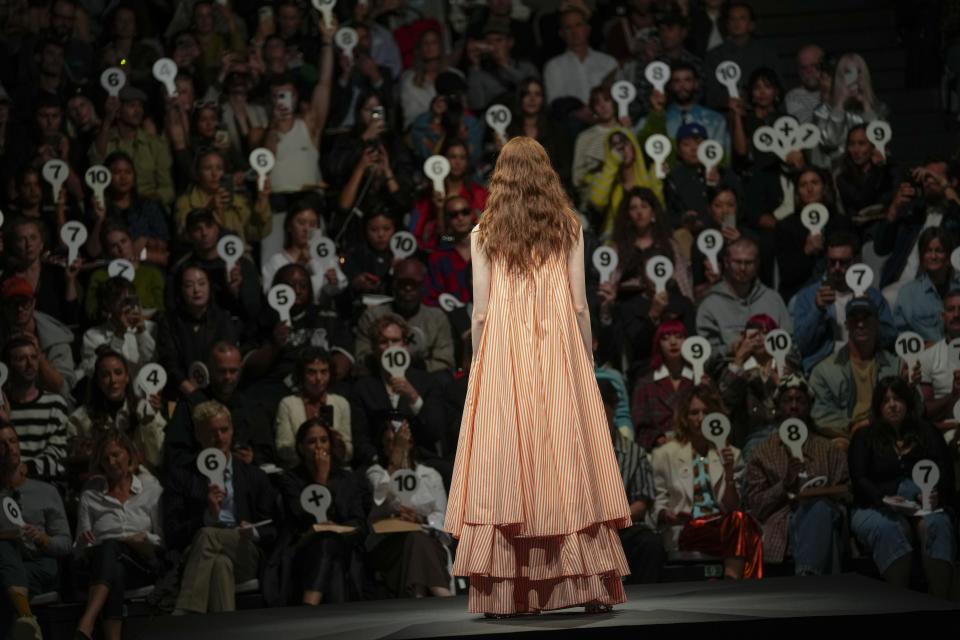 A model wears a creation as part of the Sunnei women's Spring Summer 2024 collection presented in Milan, Italy, Friday, Sept. 22, 2023. (AP Photo/Antonio Calanni)