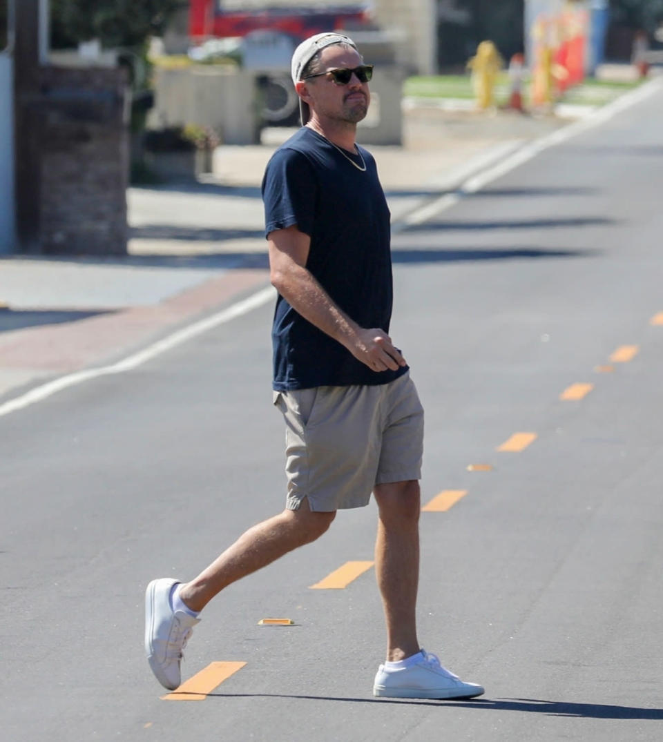 <p>Leonardo DiCaprio makes his way out of a get-together in Malibu on Aug. 27.</p>