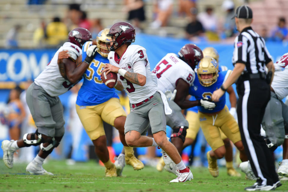 Sep 16, 2023; Pasadena, California, USA; North Carolina Central Eagles quarterback Walker Harris (3) moves out to pass against the UCLA Bruins during the second half at Rose Bowl. Mandatory Credit: Gary A. Vasquez-USA TODAY Sports