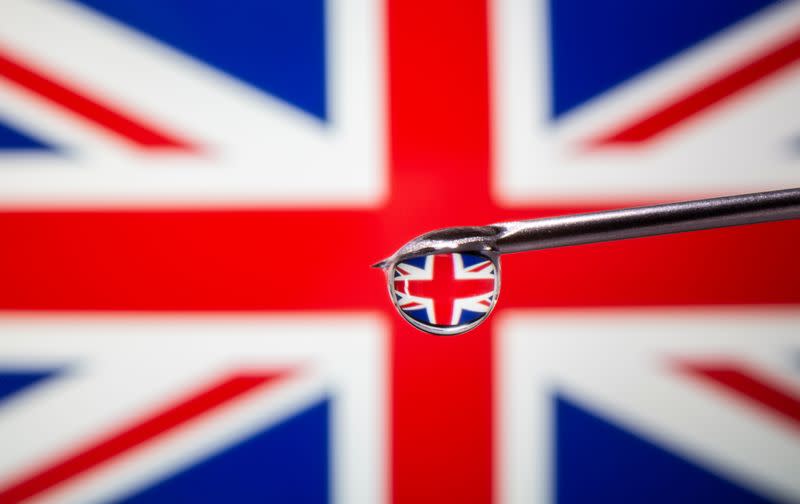 A British flag is reflected in a drop on a syringe needle in this illustration