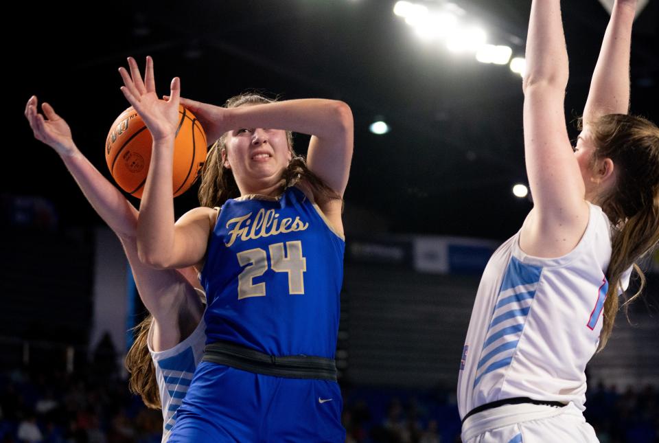 Huntingdon's Lilly Kee (24) loses the handle on the ball as Gibson County's Micah Hart (3) guards her during their Division 1 Class 2A quarterfinal game at Middle Tennessee State University in Murfreesboro, Tenn., Thursday, March 7, 2024.