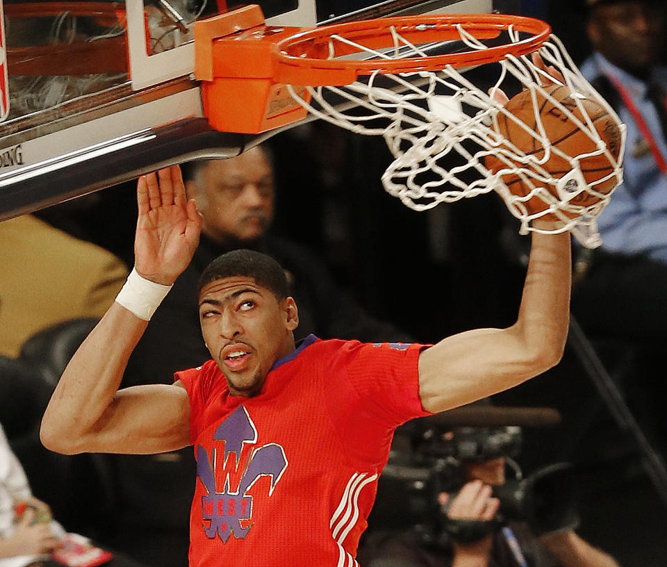 West Team's Anthony Davis, of the New Orleans Pelicans (23) dunks the ball against the West Team during the NBA All Star basketball game, Sunday, Feb. 16, 2014, in New Orleans. (AP Photo/Bill Haber)