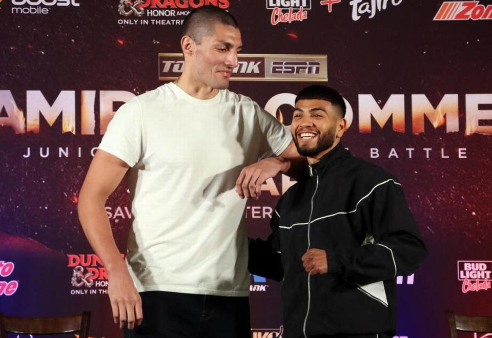 Six-foot-9 heavyweight Antonio Mireles shares a laugh with lightweight boxer Raymond Muratalla during March 23, 2023 press conference at Fresno State.