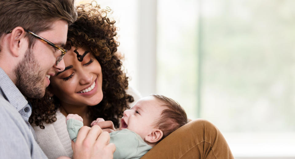 A multicultural family with a baby