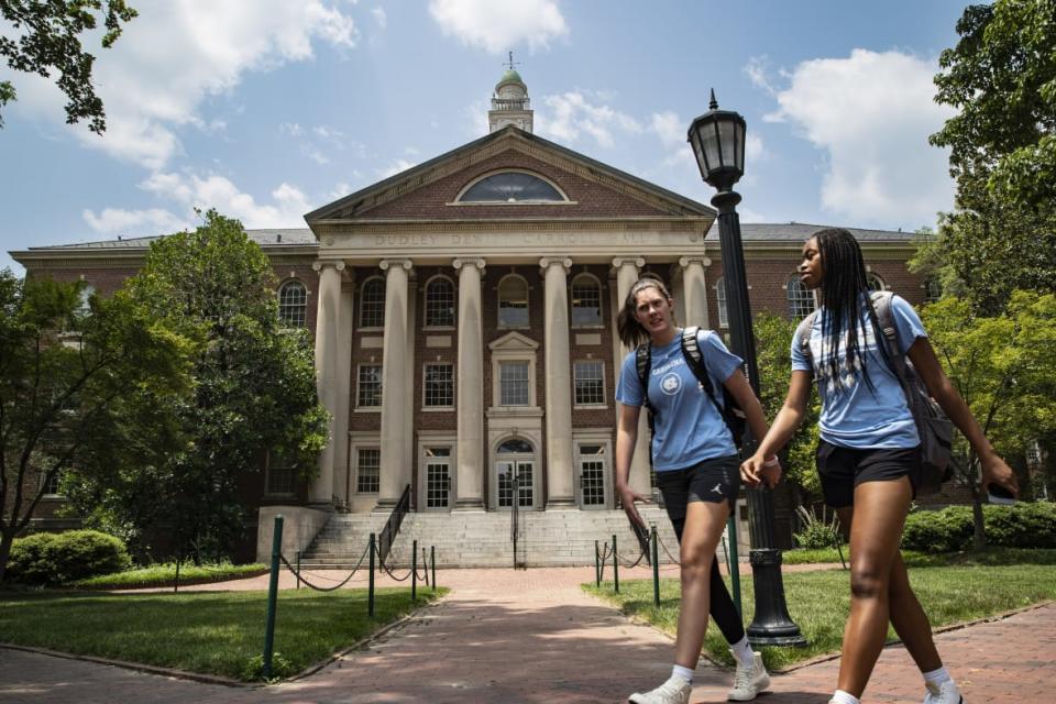 People walk on the campus of the University of North Carolina Chapel Hill on June 29, 2023 in Chapel Hill, North Carolina. (Photo by Eros Hoagland/Getty Images)