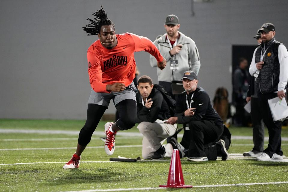 Ohio State Buckeyes defensive end Zach Harrison runs a shuttle drill during Ohio State football’s pro day at the Woody Hayes Athletic Center in Columbus on March 22, 2023. 