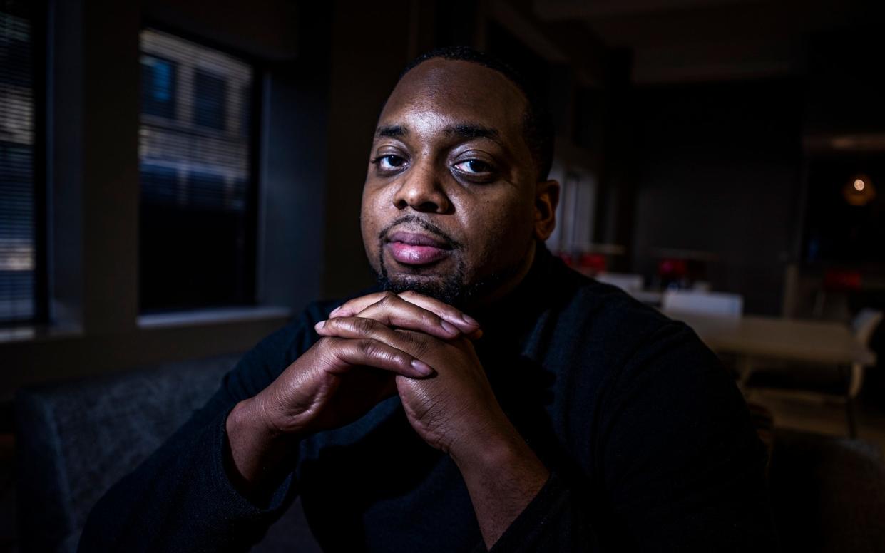 Brandon Mitchell, a juror in the trial of former Minneapolis police Officer Derek Chauvin for the killing of George Floyd, poses for a picture, in Minneapolis - AP