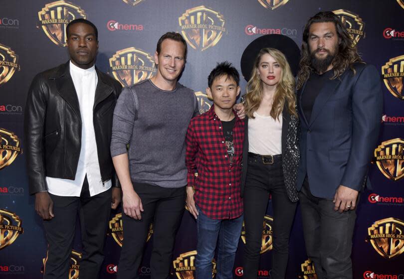 Yahya Abdul-Mateen II, from left, Patrick Wilson, director James Wan, Amber Heard and Jason Momoa, members of the cast and crew of the upcoming film "Aquaman," arrive at the Warner Bros. presentation at CinemaCon 2018, the official convention of the National Association of Theatre Owners, at Caesars Palace on Tuesday, April 24, 2018, in Las Vegas. (Photo by Chris Pizzello/Invision/AP)