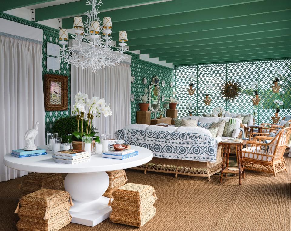 Designer Ariel Okin used drapery and trellises to give the second-floor terrace the feel of a loggia at the Kips Bay Decorator Show House Palm Beach.
