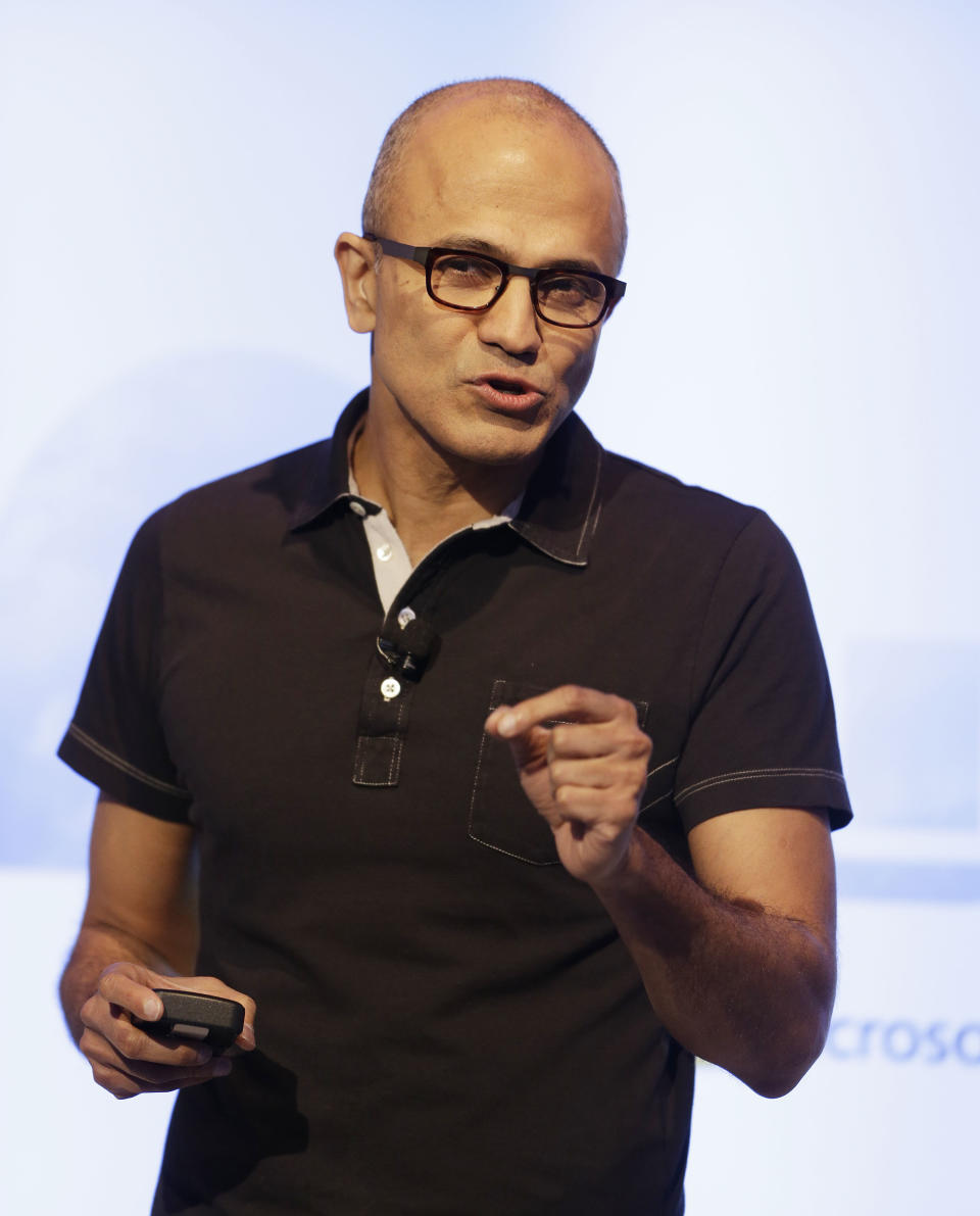 Microsoft CEO Satya Nadella gestures while speaking during a press briefing on the intersection of cloud and mobile computing Thursday, March 27, 2014, in San Francisco. Microsoft unveiled Office for the iPad, a software suite that includes programs such as Word, Excel and PowerPoint, and works on rival Apple Inc.'s hugely popular tablet computer. (AP Photo/Eric Risberg)