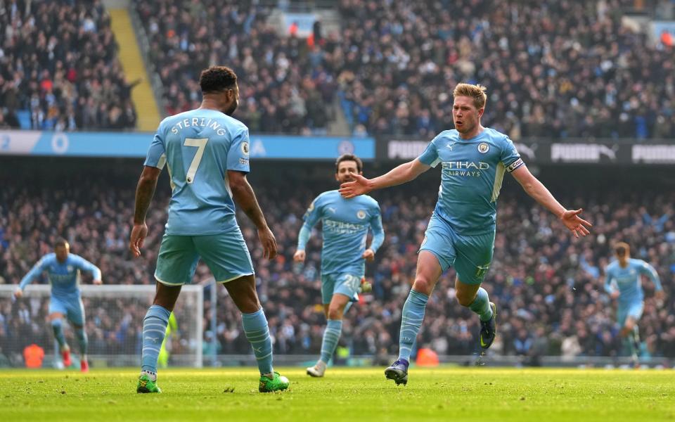 Kevin De Bruyne celebrates with teammate Raheem Sterling after scoring Manchester City's first goal - Matt McNulty - Manchester City/Manchester City FC via Getty Images