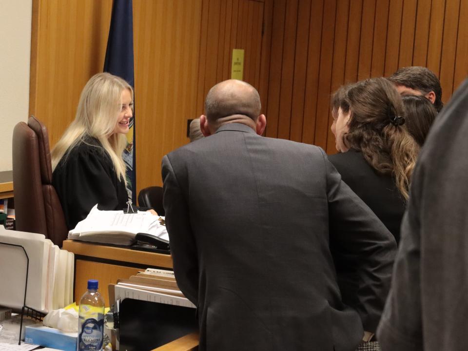 Visiting Judge Anna M. Frushour has a sidebar meeting Thursday, May 2, 2024, with attorneys in the preliminary examination of murder and evidence tampering charges against Dale Warner in the disappearance of his wife, Dee.