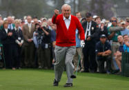 Arnold Palmer reacts after hitting his tee shot during the ceremonial start for the 2013 Masters golf tournament at the Augusta National Golf Club in Augusta, Georgia. REUTERS/Phil Noble