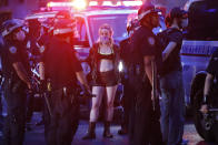 Protesters are arrested by New York Police Department officers on Park Avenue after violating curfew, Friday, June 5, 2020, in New York. Protests continued following the death of George Floyd, who died after being restrained by Minneapolis police officers on May 25. (AP Photo/John Minchillo)