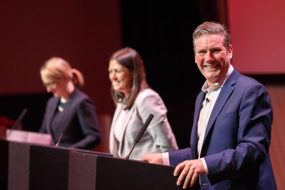 GLASGOW, SCOTLAND - FEBRUARY 15:  Sir Keir Starmer (R) smiles on stage at the Labour leadership hustings at SEC in Glasgow on February 15, 2020 in Glasgow, Scotland. Sir Keir Starmer, Rebecca Long-Bailey and Lisa Nandy are vying to replace Labour leader Jeremy Corbyn, who offered to step down following his party's loss in the December 2019 general election. Emily Thornberry was eliminated from the race yesterday after failing to secure enough nominations from local constituency parties. (Photo by Robert Perry/Getty Images)