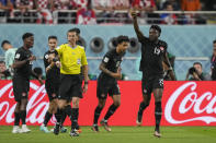 Canada's Alphonso Davies, right, celebrates after scoring the opening goal during the World Cup group F soccer match between Croatia and Canada, at the Khalifa International Stadium in Doha, Qatar, Sunday, Nov. 27, 2022. (AP Photo/Martin Meissner)