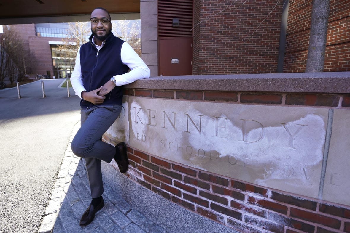 Quentin Fulks, who managed Sen. Raphael Warnock’s reelection campaign in 2022, stands for a portrait on Feb. 2, 2023 outside the John F. Kennedy School of Government at Harvard University, where he is studying on a politics fellowship. (AP Photo/Charles Krupa)