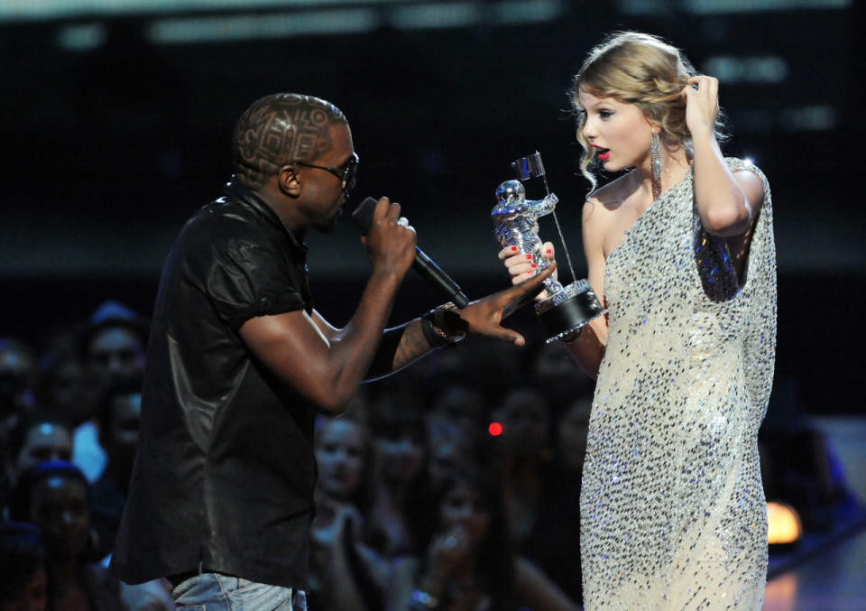 Kanye West Doesn’t Let Taylor Swift Finish (2009) - In a cruel move that’s been likened to pig’s blood being dumped on Carrie at the prom and is considered to be the craziest VMAs stunt ever, in 2009 Kanye ruined America’s sweetheart’s big moment when he hopped onstage to protest her winning the Best Female Video Moonman over “Single Ladies,” aka the BEST VIDEO OF ALL TIME. (Capslock is Kanye’s, not Yahoo’s.) It may have been the greatest thing that ever happened to Taylor’s career, which took off as the entire music community sympathetically rallied around her. But it was still rude. Why you gotta be so mean, Kanye? (Source: Getty Images)