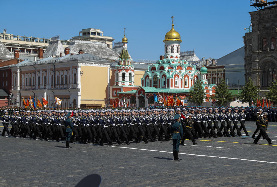 Russian soldiers march in Red Square during the Victory Day military parade marking the 75th anniversary of the Nazi defeat in WWII, in Moscow, Russia, Wednesday, June 24, 2020. The Victory Day parade normally is held on May 9, the nation's most important secular holiday, but this year it was postponed due to the coronavirus pandemic. (AP Photo/Pavel Golovkin, Pool)