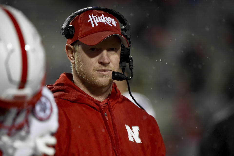 FILE - In this Nov. 23, 2019, file photo, Nebraska head coach Scott Frost looks on during the second half of an NCAA college football game against Maryland in College Park, Md. The Big Ten will start playing football at what normally would be midseason. The coronavirus pandemic limited or eliminated most spring practices. Positive COVID-19 tests and precautions, along with uncertainty about whether there would even be a season, caused disruptions in summer workouts and preseason practices. (AP Photo/Will Newton, File)