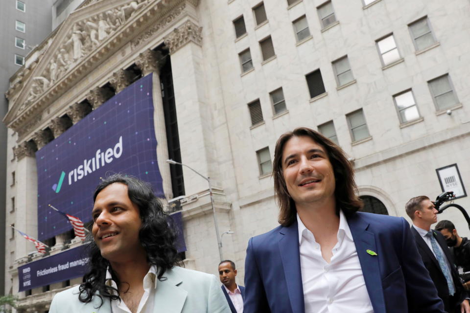 Robinhood Markets, Inc. co-founder Baiju Bhatt and CEO and co-founder Vlad Tenev walk outside the New York Stock Exchange (NYSE) after the company's IPO in New York City, U.S., July 29, 2021.  REUTERS/Andrew Kelly